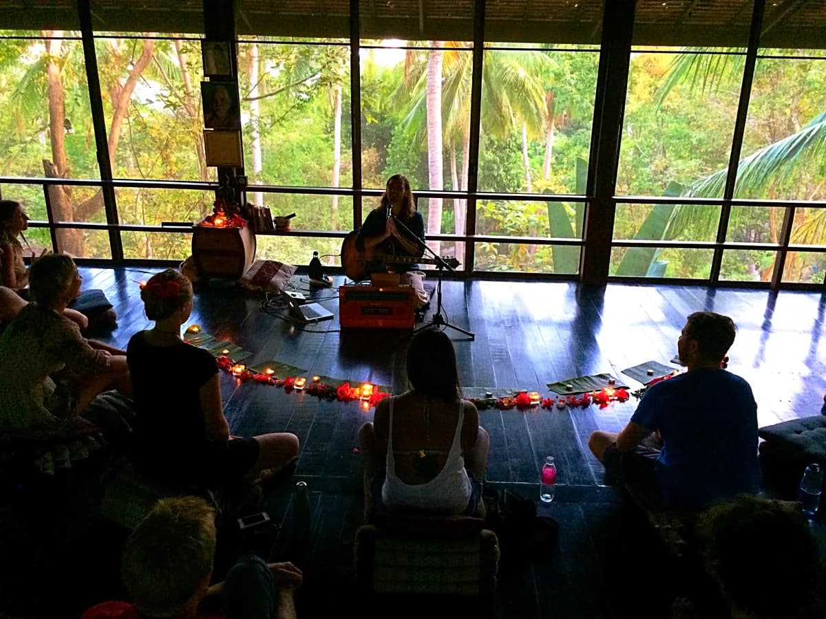 Workshop circle in tropical jungle studio with candles